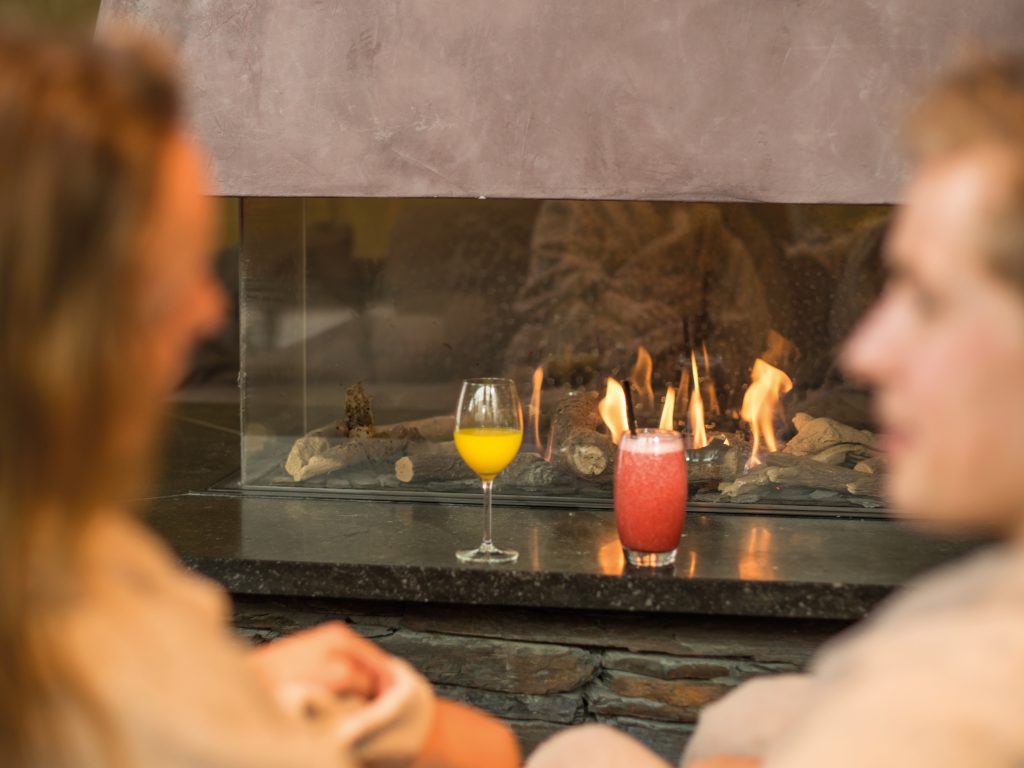 Enjoying by the fire in the Wellness Restaurant of Fort Resort Beemster.